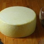 Cheese on pine table