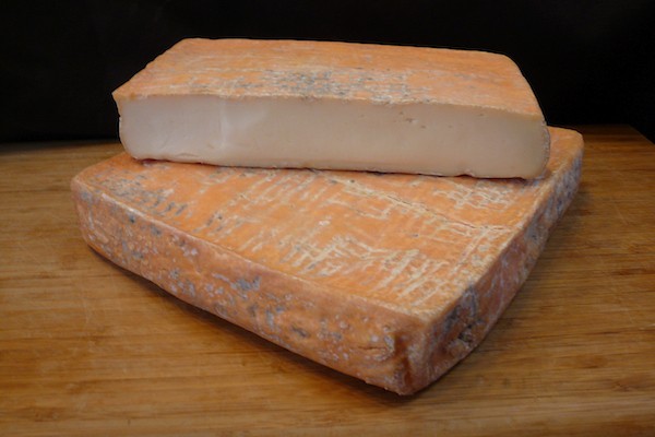 Taleggio cheese cut and stacked
