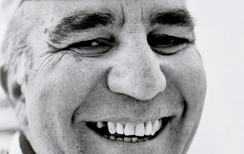 Guffanti Formaggi's cheese master smiles genially in a close up