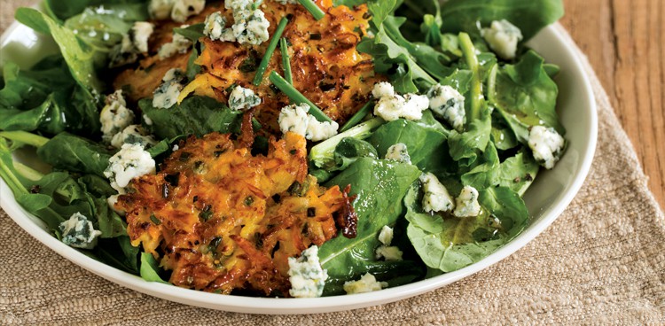 This robust salad course marries salty, sweet, spicy, and tangy flavors with an ideal mix of textures. For a delicious finger-food variation on the recipe, omit the salad and top each warm pancake with blue cheese and a generous grind of black pepper.