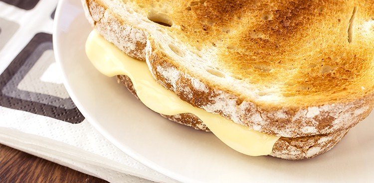 melted cheese in a grilled cheese sandwich