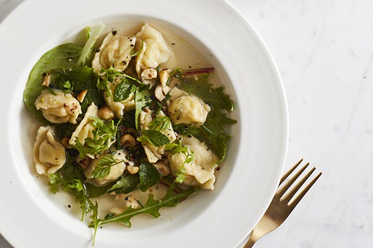 Hazelnut agnolotti with brothy spring greens. Photograph by Evi Abeler