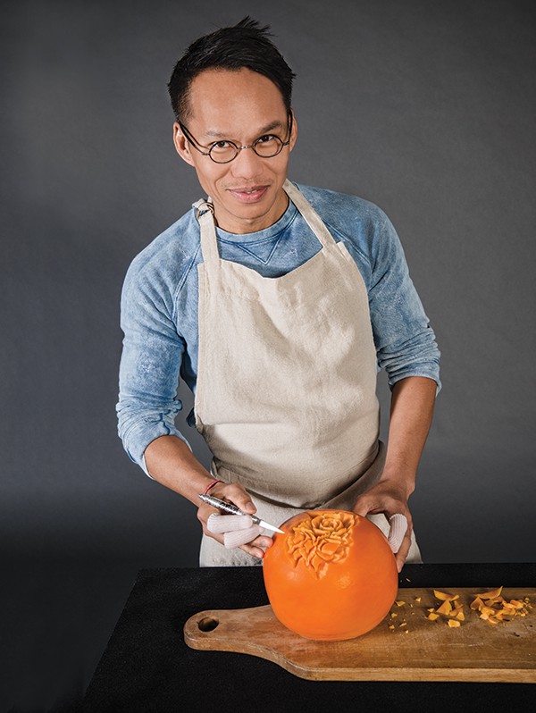 Thai artist Krai carves a sculpture with mimolette